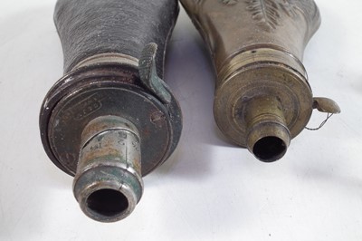 Lot 219 - Vintage shotgun reloading tools and two powder flasks.