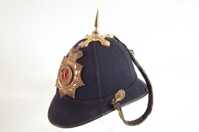 Lot 420 - Royal Jersey Infantry blue cloth helmet