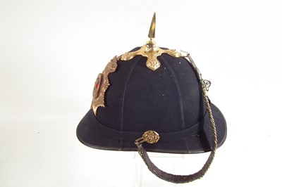 Lot 420 - Royal Jersey Infantry blue cloth helmet