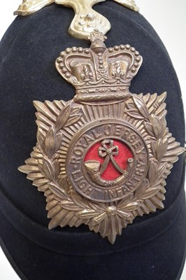 Lot 420 - Royal Jersey Infantry blue cloth helmet