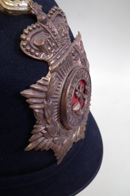 Lot 420 - Royal Jersey Infantry blue cloth helmet