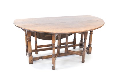 Lot 250 - 20th-century oak drop-leaf dining table of 17th-century design