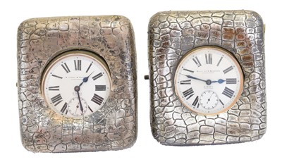 Lot 198 - A pair of Edward VII silver fronted pocket watch holders