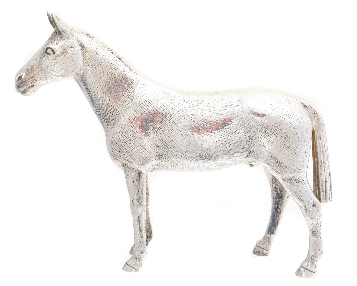 Lot 208 - A solid silver model of a horse