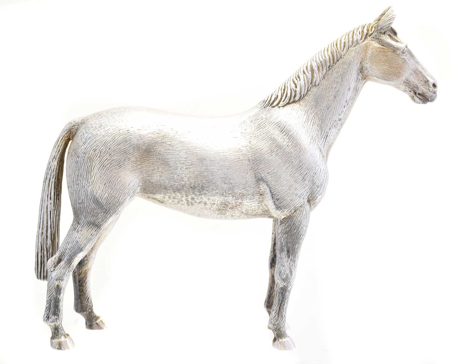 Lot 209 - A solid silver model of a horse