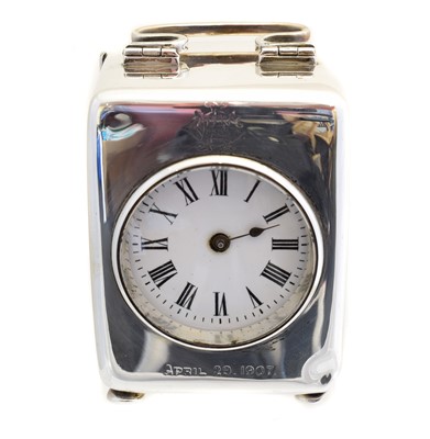 Lot 156 - An Edward VII silver cased travel clock