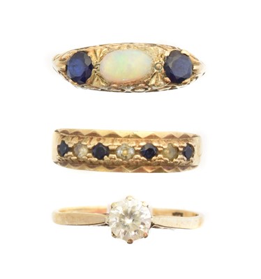 Lot 161 - Three gem-set dress rings