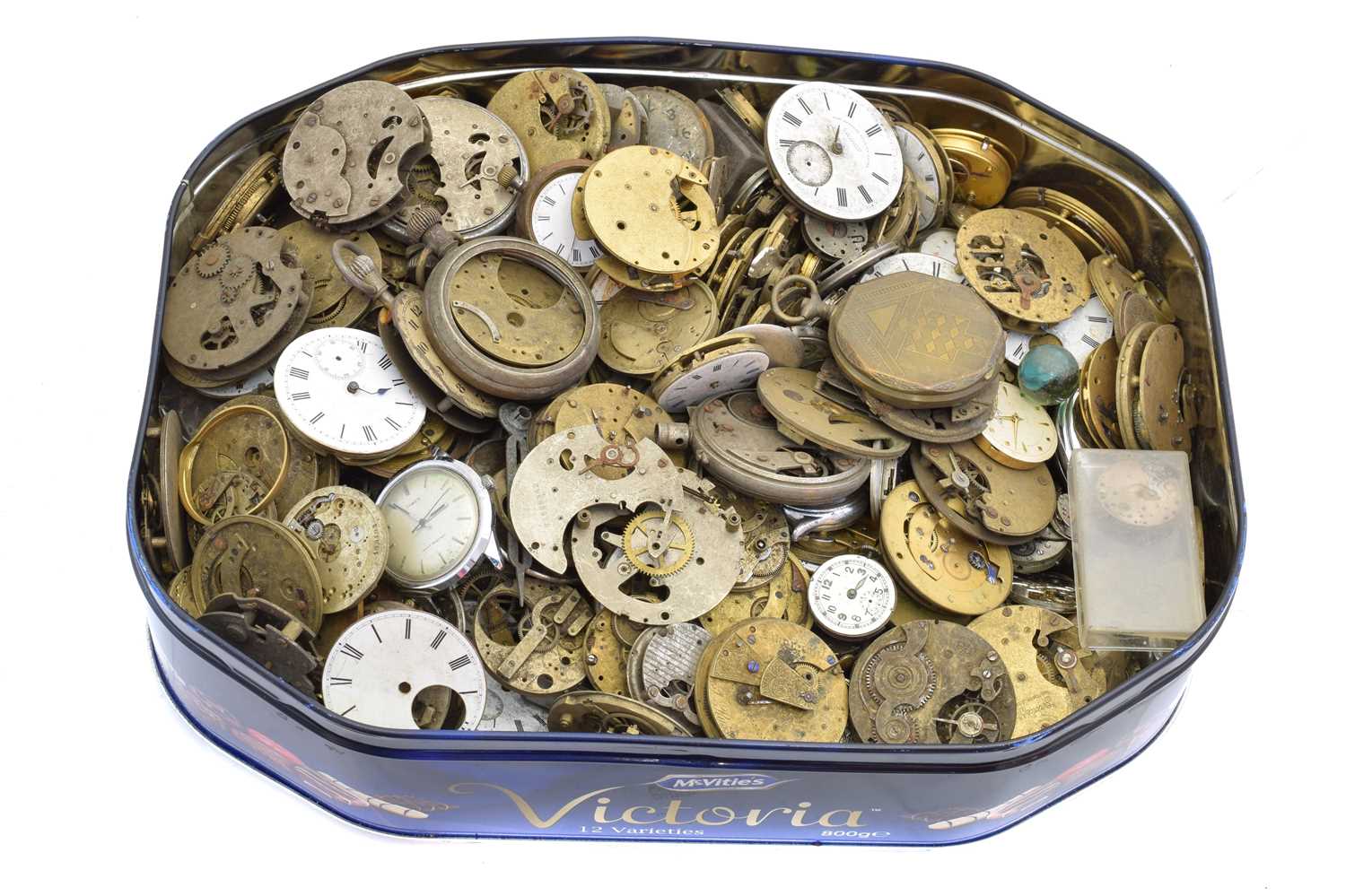 Lot 61 - A box of pocket watch and wristwatch movements and parts