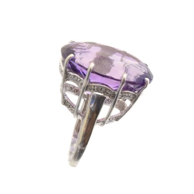 Lot 235 - A 9ct gold amethyst and diamond dress ring