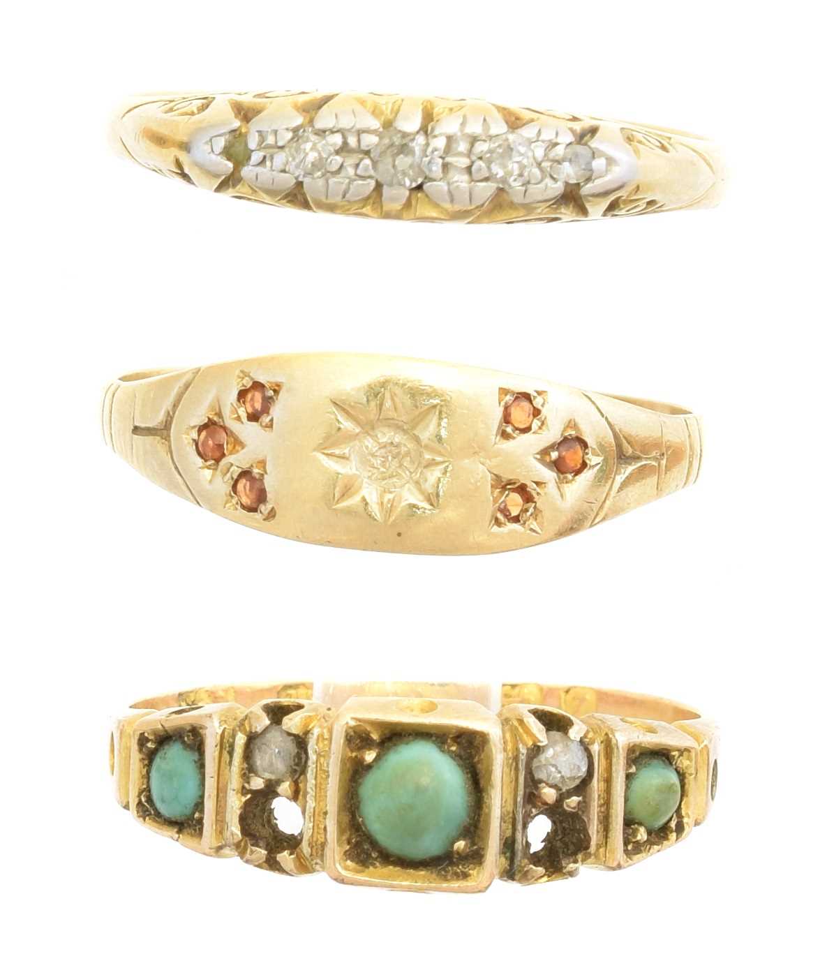 Lot 124 - Three gem set dress rings