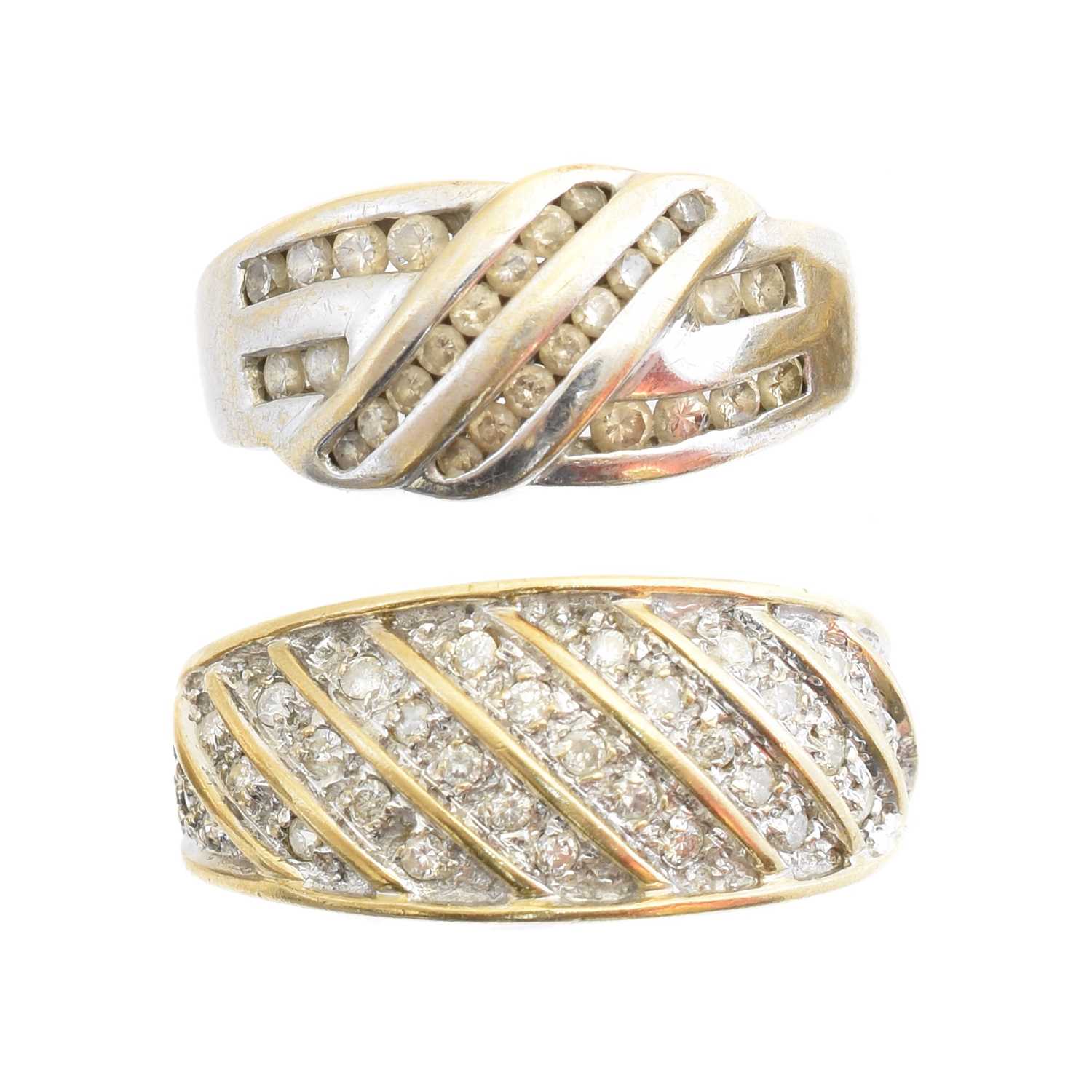 Lot 186 - Two 9ct gold diamond band rings