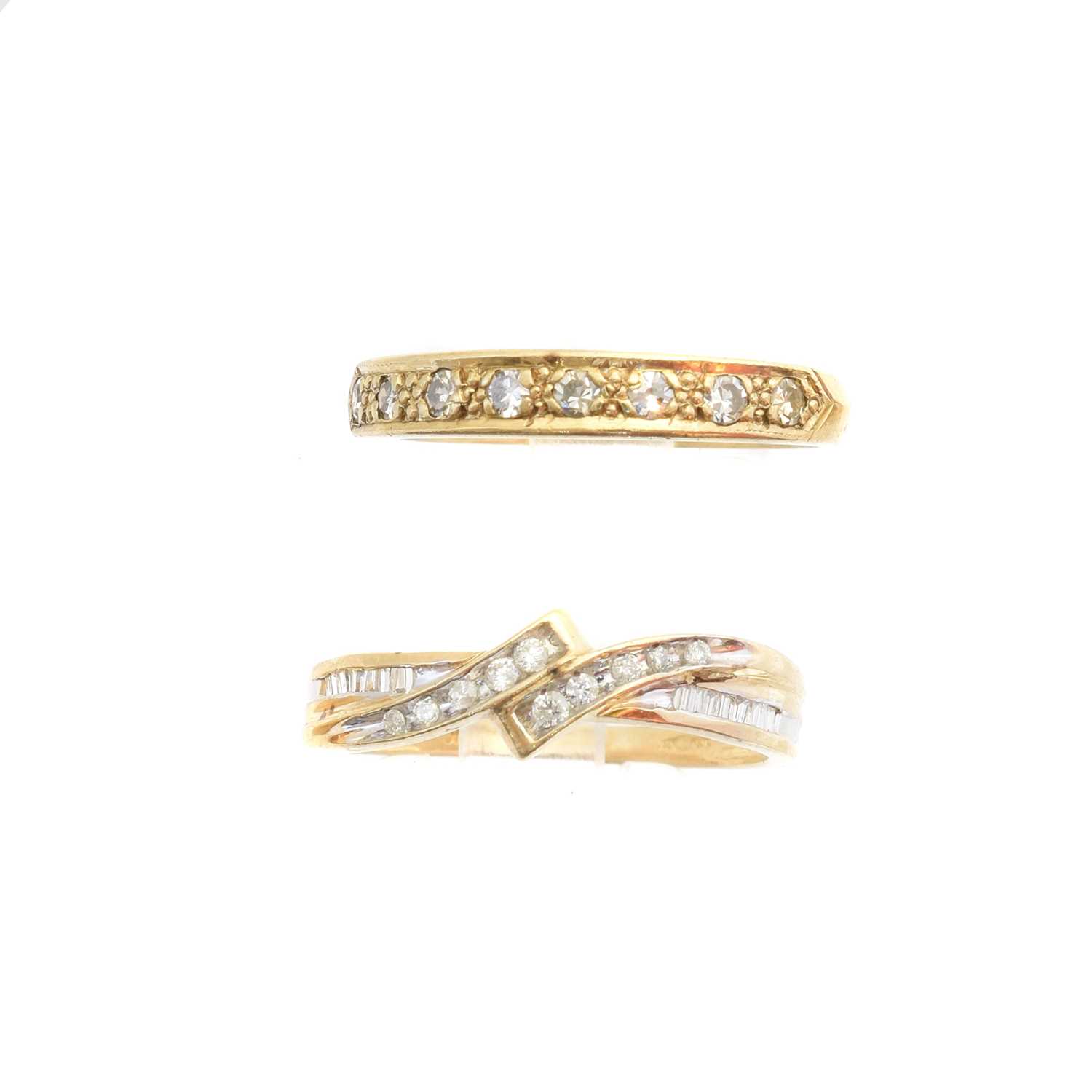 Lot 137 - Two 9ct gold diamond band rings