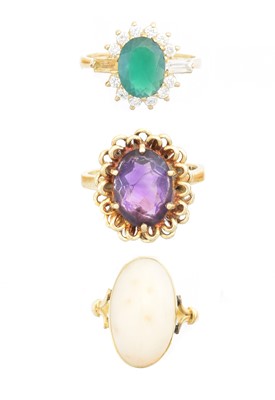 Lot 155 - Three gem set dress rings
