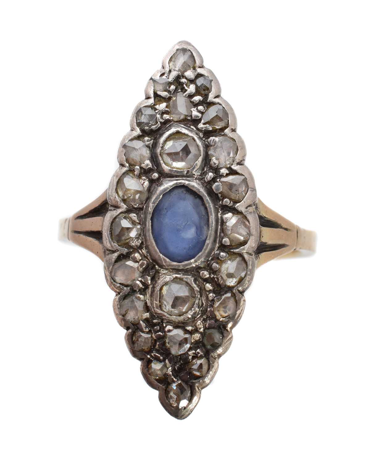 Lot 220 - A sapphire and diamond cluster ring