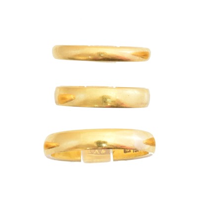 Lot 142 - Three 22ct gold band rings