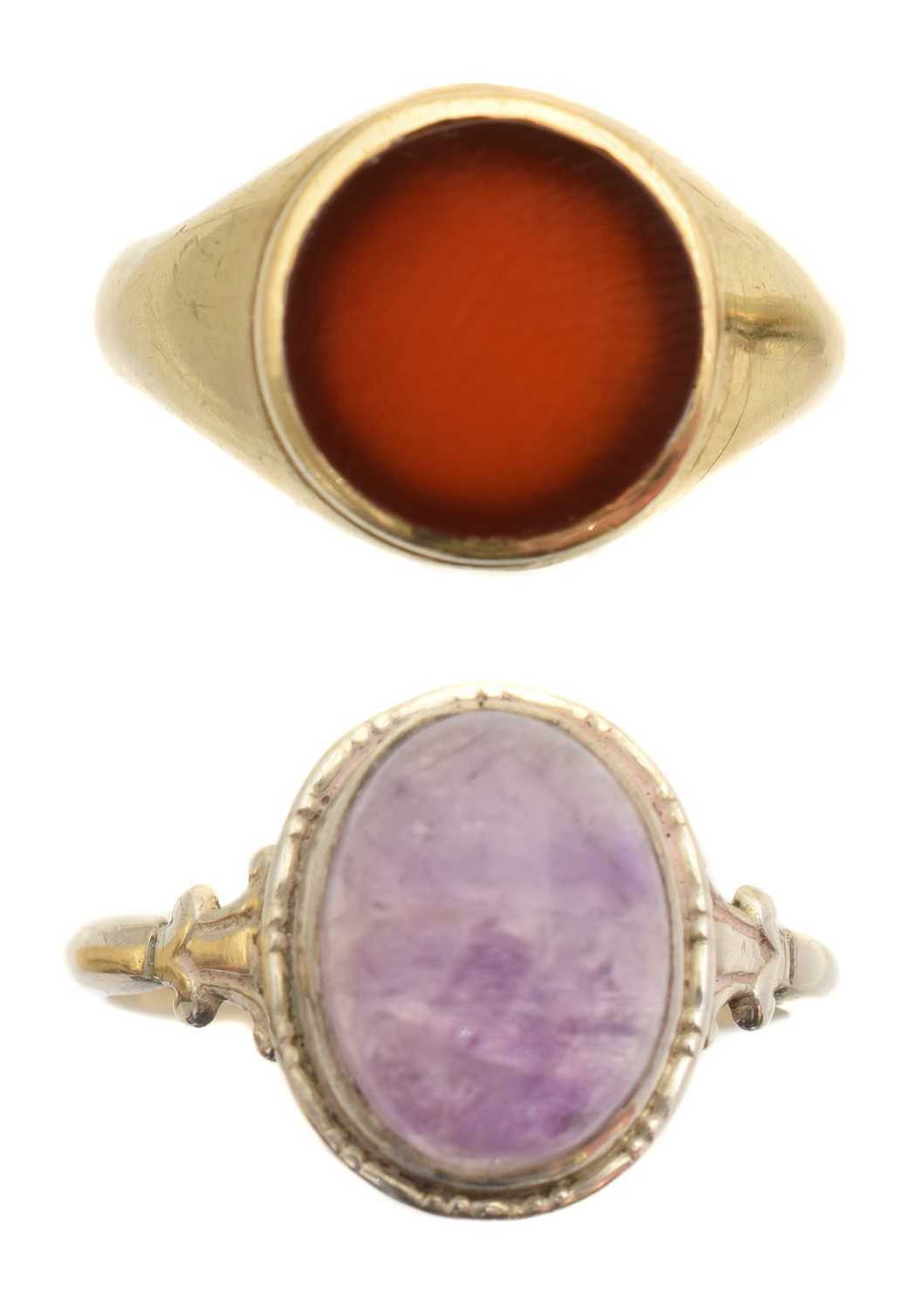 Lot 49 - Two gem set dress rings