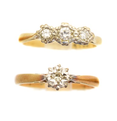 Lot 130A - Two diamond dress rings