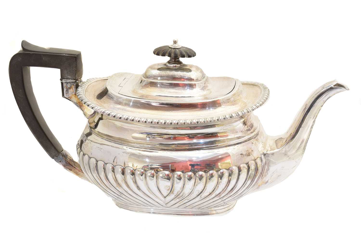 Lot 178 - A George V silver teapot