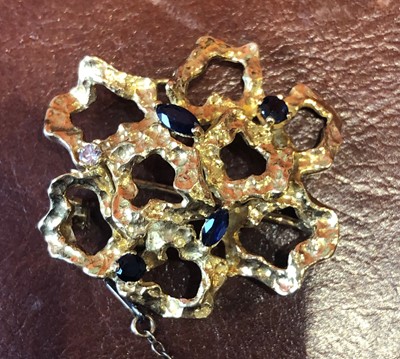 Lot 20 - A 1960s sapphire and diamond brooch