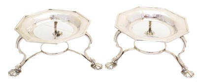 Lot 187 - A pair of George V silver table warmers