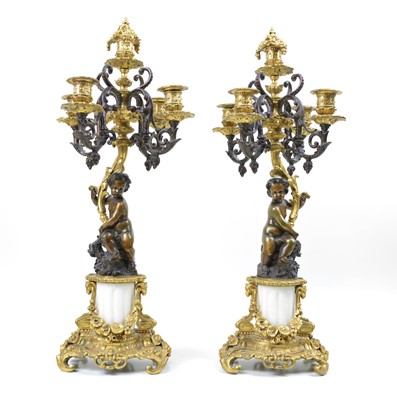Lot 331 - A pair of early 20th-century bronze and ormolu mounted four branch candelabra