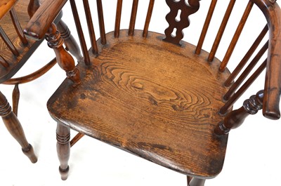 Lot 376 - Four mid 19th Century yew and elm low back Windsor chairs