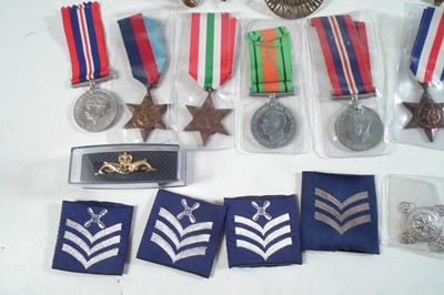 Lot 254 - Approximately seventy five Cap badges