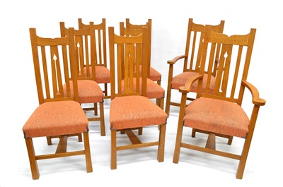 Lot 252 - Frank Hudson & Son Ltd, Arts & Crafts style Extendable Oak Dining Table and Eight Chairs