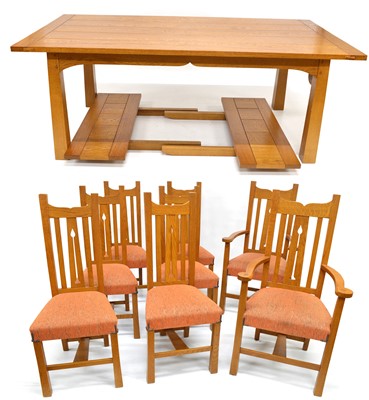 Lot 252 - Frank Hudson & Son Ltd, Arts & Crafts style Extendable Oak Dining Table and Eight Chairs