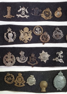 Lot 249 - Twenty cap badges