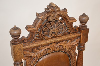 Lot 313 - A set of eight mid-19th-century continental carved oak single dining chairs