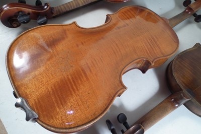 Lot 20 - Four violins in cases