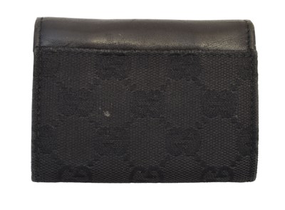 Lot 126 - A Gucci Flap Coin Case Wallet