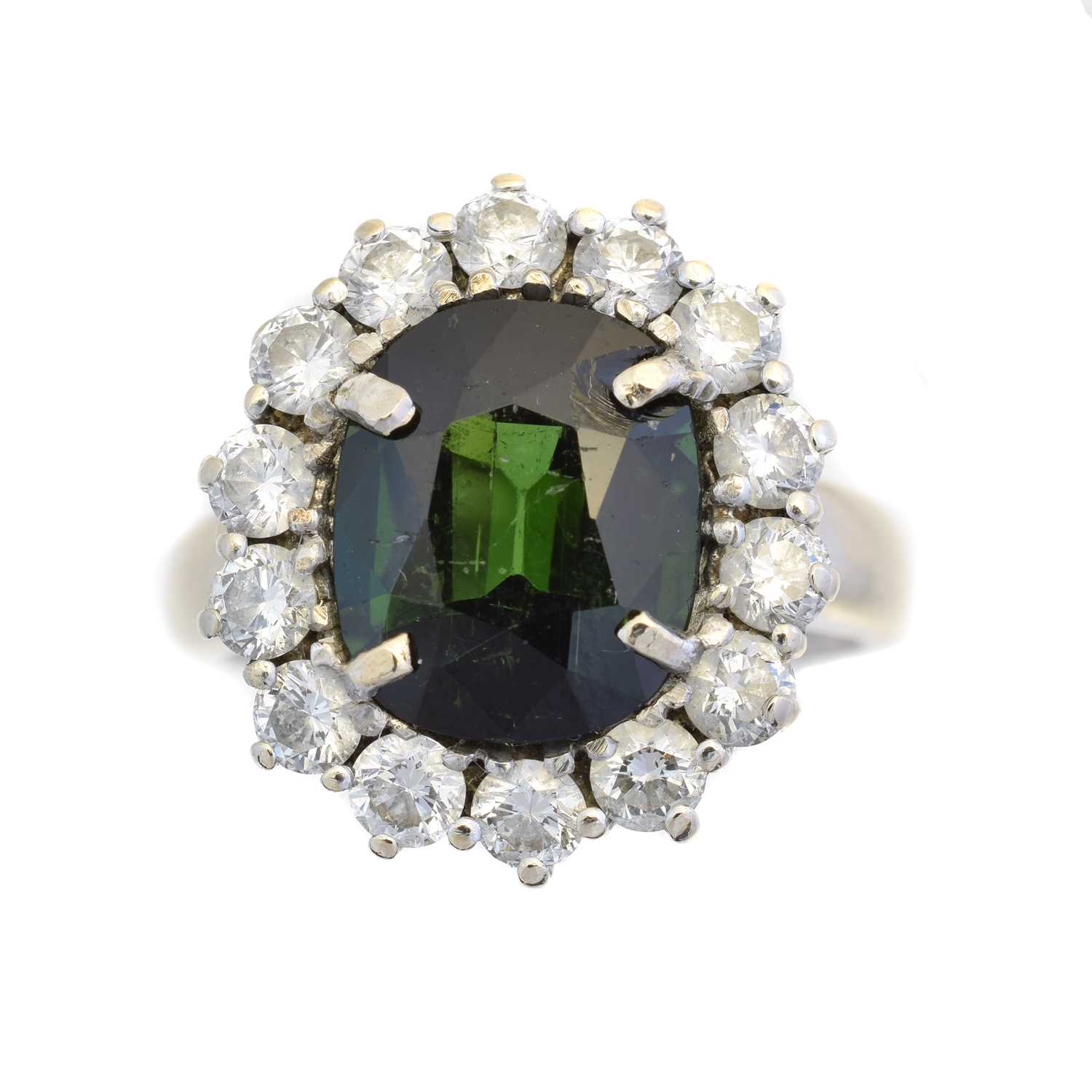 Lot 98 - A tourmaline and diamond cluster ring