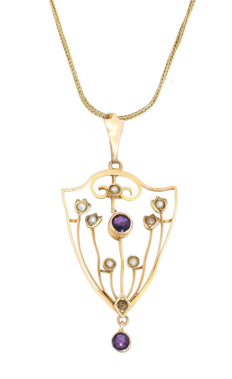 Lot 34 - An early 20th century amethyst and seed pearl pendant