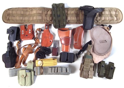 Lot 343 - Collection of pistol holsters and related accessories
