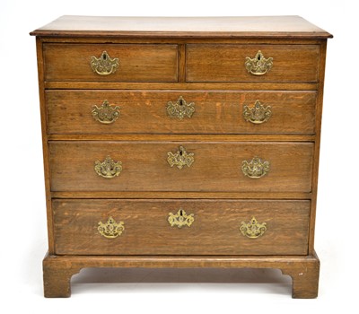 Lot 277 - George III oak chest of drawers