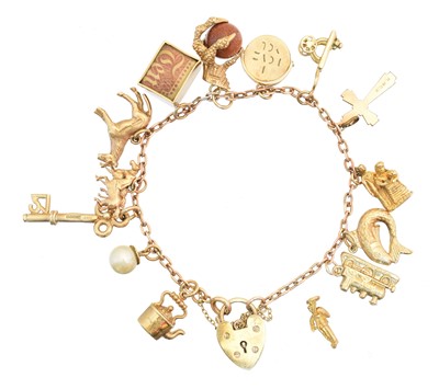 Lot 30 - A 9ct gold charm bracelet