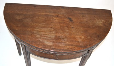 Lot 287 - George III mahogany fold-over tea table