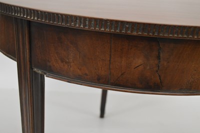 Lot 287 - George III mahogany fold-over tea table
