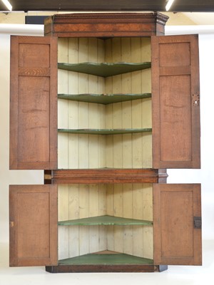 Lot 281 - George III oak corner cupboard