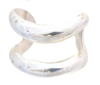 Lot 23 - A silver cuff bangle by Elsa Peretti for Tiffany & Co.