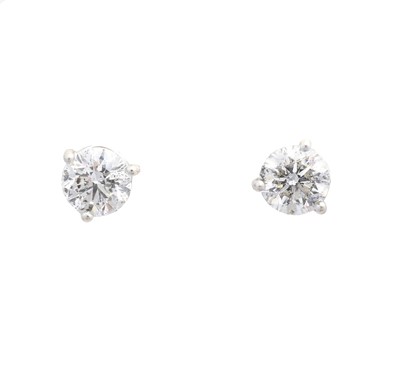 Lot 35 - A pair of brilliant cut diamond stud earrings