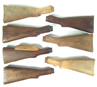 Lot 356 - Seven Lee Enfield rifle butts.