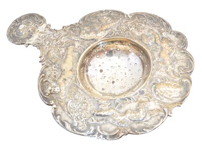 Lot 119 - A late 19th century continental silver tea strainer