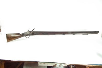Lot 51 - Massive flintlock wall gun by Lacy and Co.