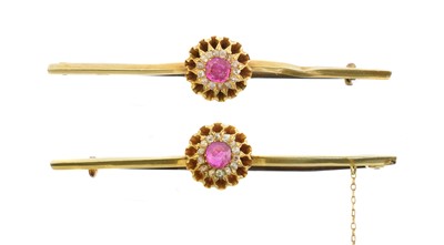 Lot 17 - A pair of ruby and diamond brooches