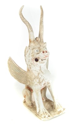 Lot 155 - Grotesque Tang style temple dog.