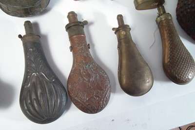 Lot 323 - Collection of fourteen powder flasks.