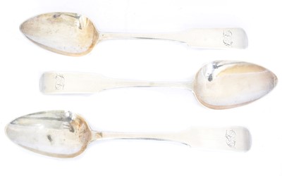 Lot 103 - Three Scottish silver serving spoons